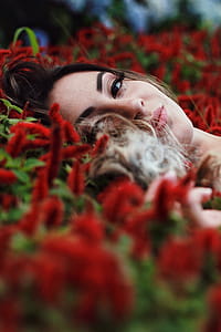 Photography of a Woman Lying on Flowers thumbnail