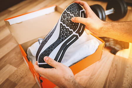 Opening the box of a new pair of shoes thumbnail