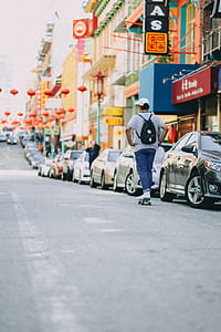 man riding on cruiser board thumbnail