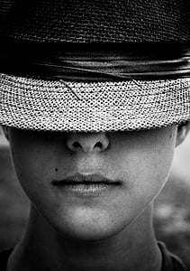 photo of person covering eyes using hat thumbnail
