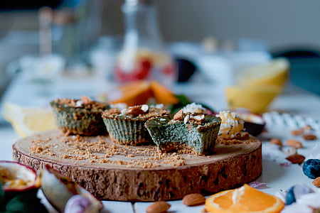 cupcakes on brown chopping board thumbnail