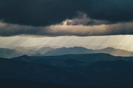 black hills under grey cloudy sky thumbnail
