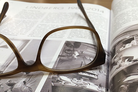 eyeglasses with brown tortoiseshell frames thumbnail
