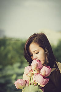 woman holding roses thumbnail