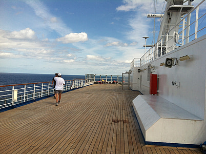 man stands on ship thumbnail