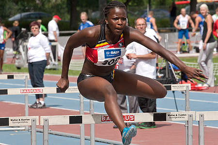 sprinter jumping over white bracket thumbnail