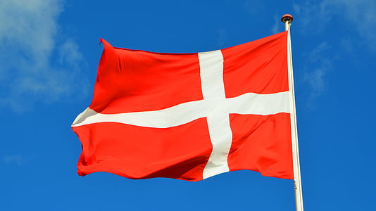 red and white flag under clear sky thumbnail