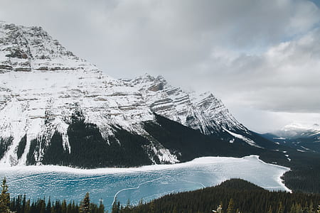 landscape photography of mountain covered in snow thumbnail