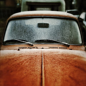selective focus photography of a brown Volkswagen Beetle thumbnail