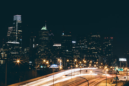 time-lapse photography of cars with skyscraper background thumbnail