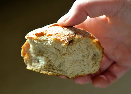person holding slice bread thumbnail