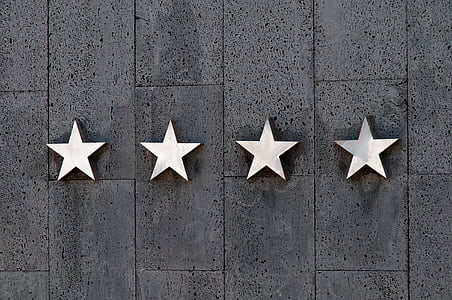 four white star wall decors thumbnail