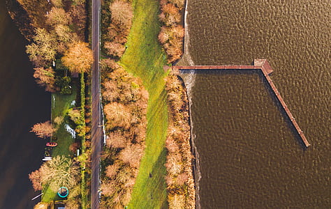 aerial view of docking bay on body of water thumbnail