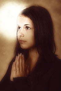 woman wearing black tops praying thumbnail