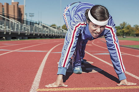 woman in blue track jacket thumbnail