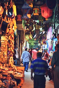 people walking inside store stall thumbnail