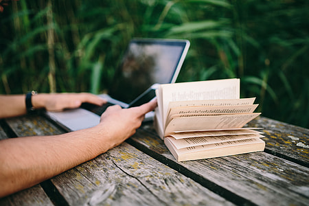Reading book at lake thumbnail