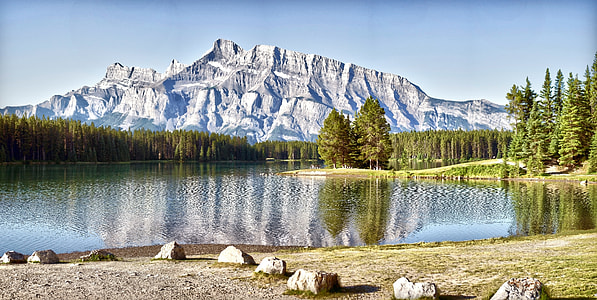 body of water overlooking mountain thumbnail