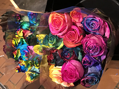 multicolored flower bouquet placed near beige surface thumbnail