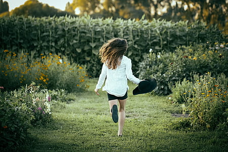 woman running on grass thumbnail