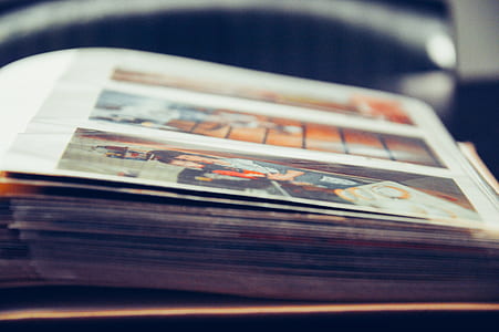 selective focus photography of photo album thumbnail