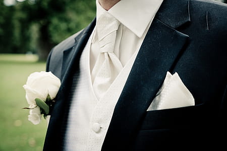 Man Wearing Suit in Close-up Photography thumbnail