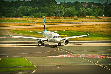 airliner on airport runway thumbnail