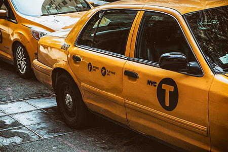 A shot of a classic yellow New York Taxi, image captured in Manhattan, NYC with a Canon 5D thumbnail