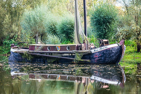blue and brown wooden boat thumbnail
