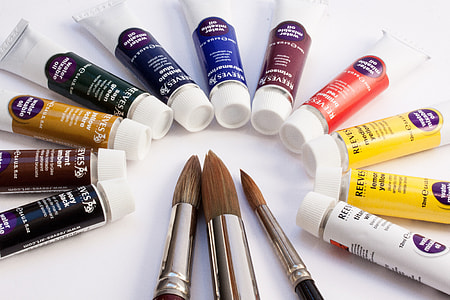 assorted-brand soft-tubes and makeup brushes thumbnail