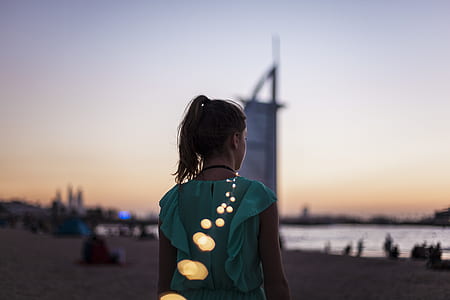 person looking at body of water thumbnail