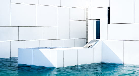 white building with water thumbnail
