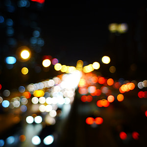 photo of white, red, and brown bokeh lights thumbnail