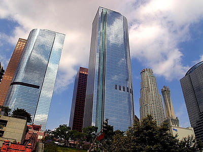 worm's-eye view photo of scyscraper during daytime thumbnail