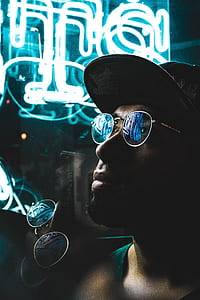 man wearing sunglasses and black cap thumbnail