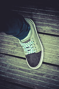 person wearing black and gray Vans skate shoe thumbnail