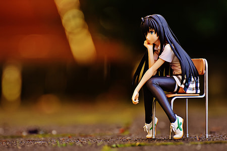 shallow focus photography of blue haired anime girl sitting on chair thumbnail