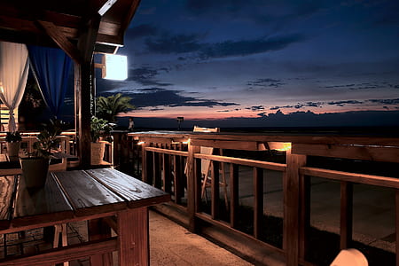 Vacant Tables and Chairs in the Balcony thumbnail