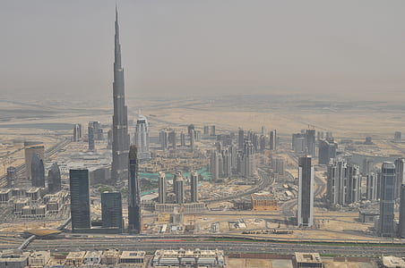 areal photography of city with high rise buildings thumbnail
