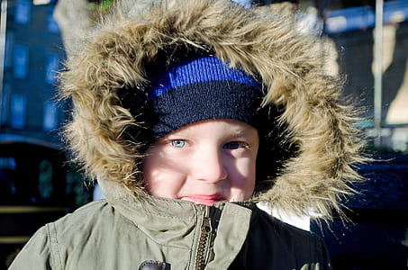toddler wearing gray coat at daytime thumbnail