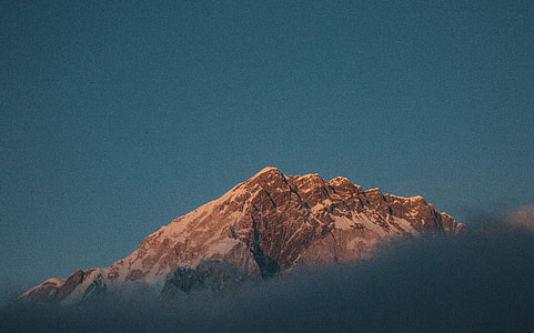 photo of brown mountain top at daytime thumbnail