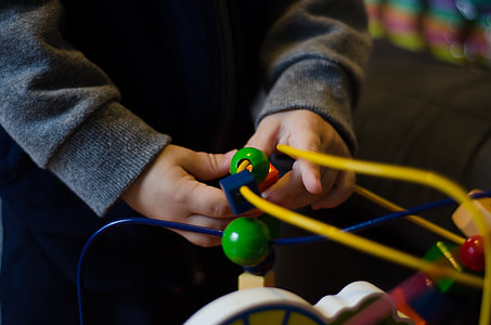 toddler playing activity toy thumbnail