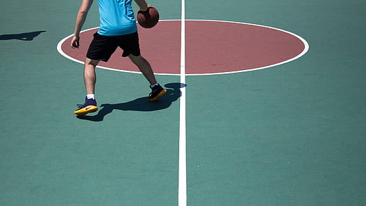 person holding basketball thumbnail