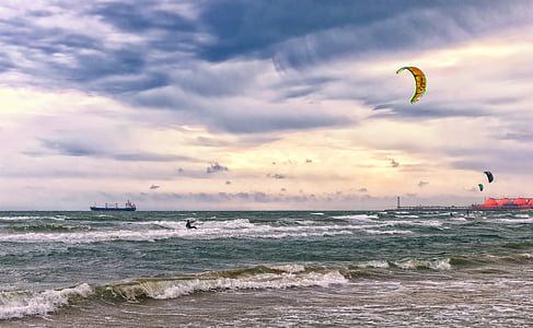 people riding surfboards thumbnail