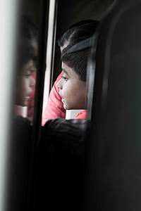 boy looking outside thumbnail
