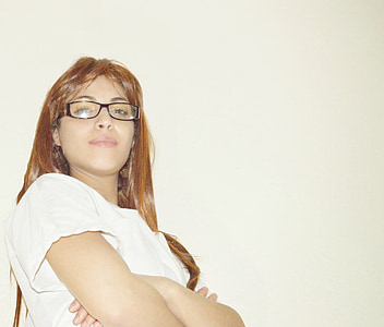 woman standing behind white background thumbnail