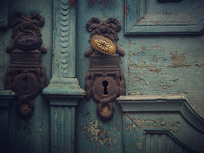 green wooden door with brown lock thumbnail