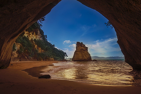 rock formation on body of water thumbnail