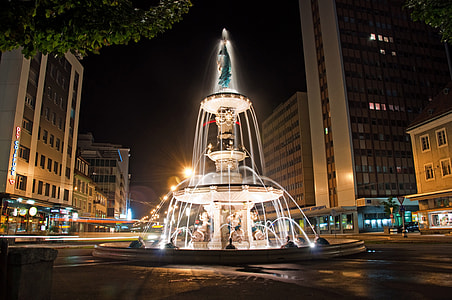 Grand Fountain Lighted at Night in La Chaux De Fonds, Switzerland thumbnail