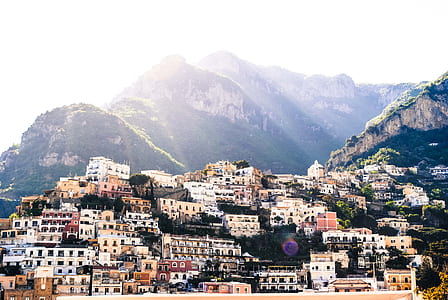 landscape photography of white houses thumbnail